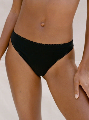 Kit Undergarments Organic Cotton Mid-Rise Thong in Onyx, 95% organic cotton, 5% spandex