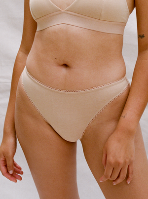 Kit Undergarments Organic Mid-Rise Thong in Sand, 95% organic cotton, 5% spandex