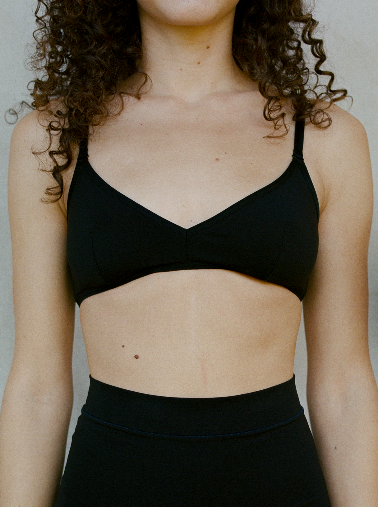 Kit Undergarments Lightweight Triangle Soft Bra in Onyx, 63% nylon, 37% spandex